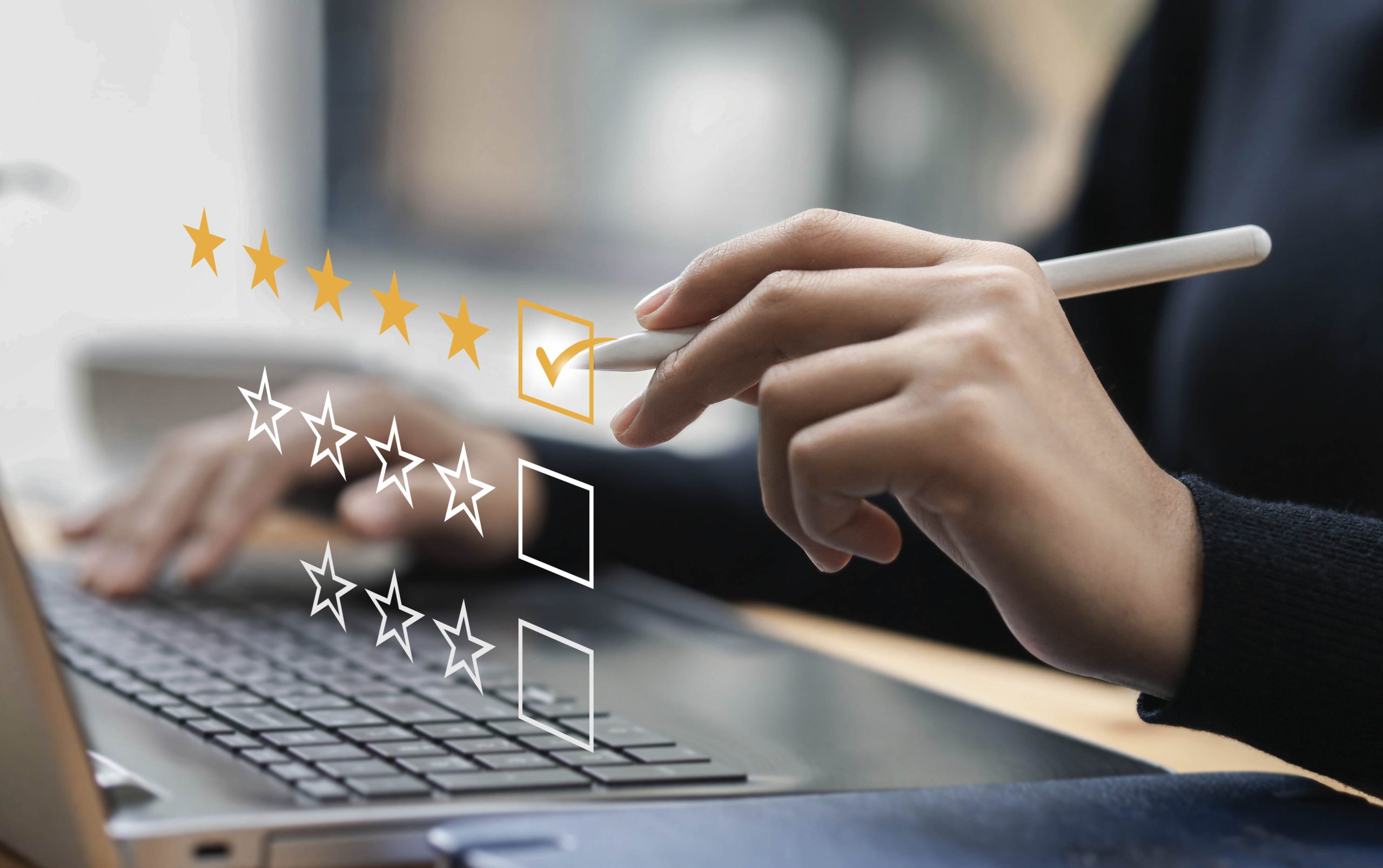 person checking a tick box for star ratings