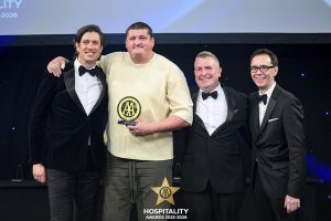 Gareth Ward wins AA Chefs' Chef of the Year 2025 – the award was presented to him by TV host Vernon Kay.